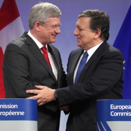 Prime Minister Stephen Harper and European Commission President Jose Manuel Barroso shaking hands after signing Canada-EU Free Trade Agreement on Friday 18, October 2013 at the European Commission in Brussels, Belgium.